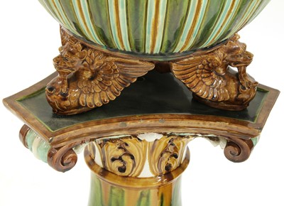 Lot 6 - A pair of Doulton Lambeth stoneware jardinières on stands