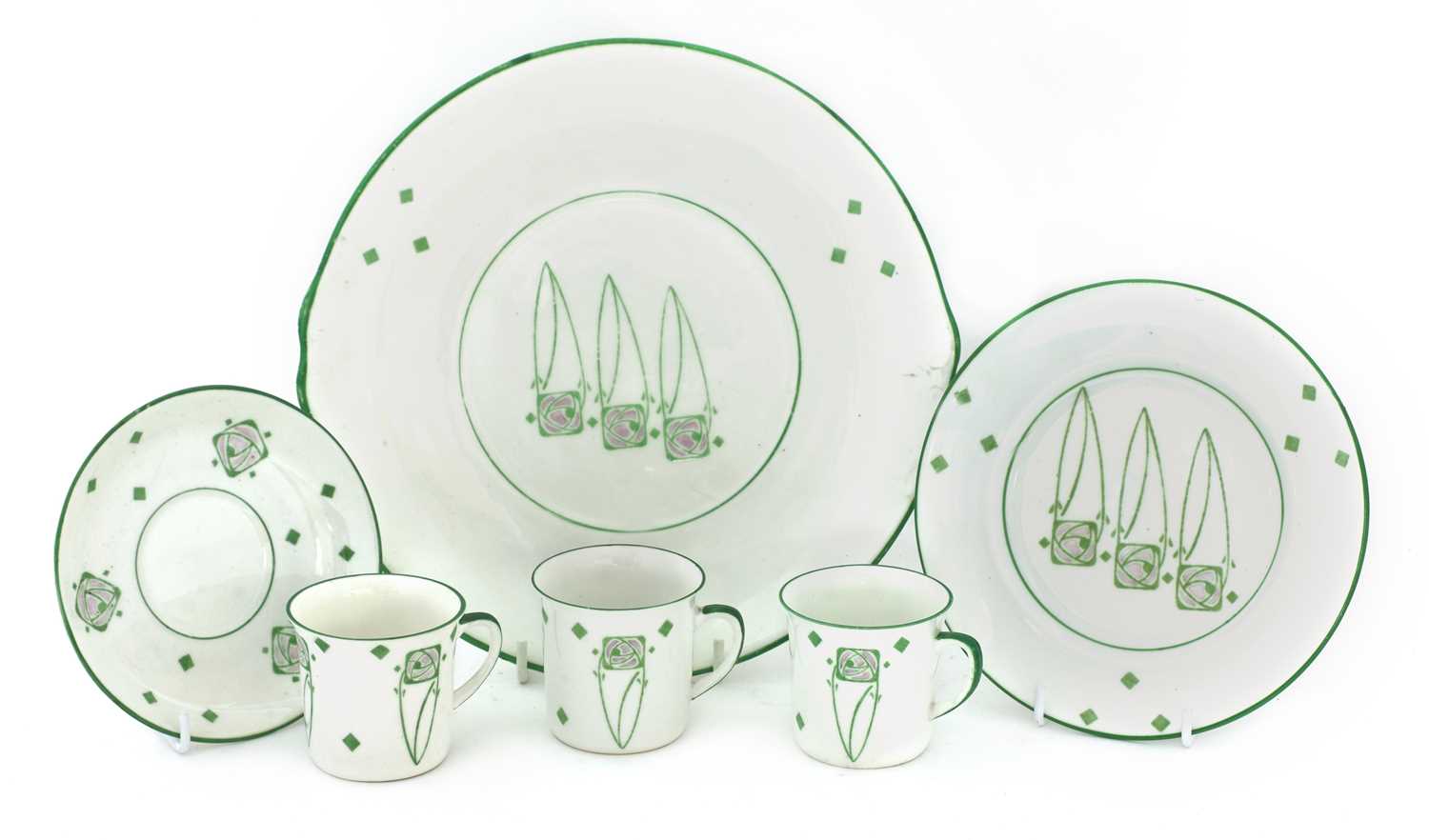 Lot 48 - A set of six Foley Peacockware 'Glasgow Rose' trios