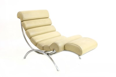 Lot 230 - A cream leather lounger