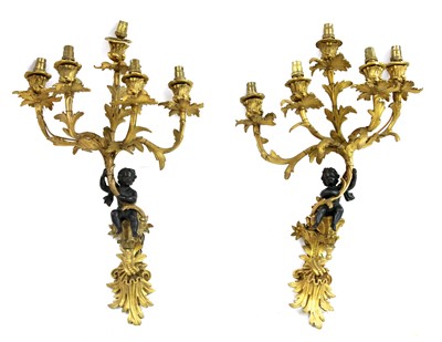 Lot 382 - A pair of Louis XV-style ormolu and bronze wall lights