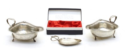 Lot 90 - A pair of early 20th century silver sauce boats