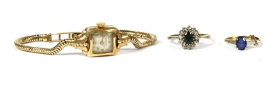 Lot 205 - A gold sapphire and cubic zirconia cluster ring