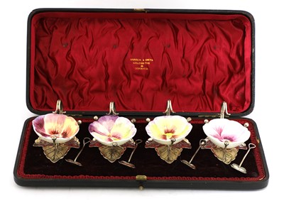 Lot 46 - A set of four silver and pottery cups