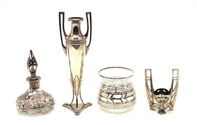 Lot 108 - An Art Nouveau pierced silver mounted glass scent bottle and cover