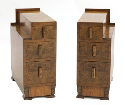 Lot 455 - A pair of Art Deco walnut bedside chests