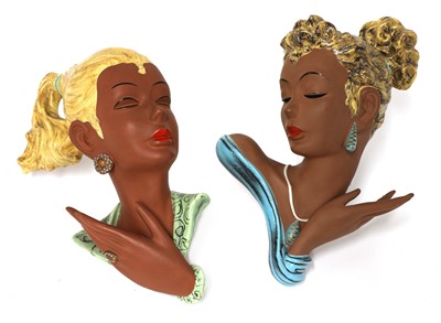 Lot 365 - Two Austrian glazed pottery wall masks