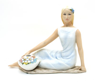 Lot 121 - An Italian pottery figure of a lady
