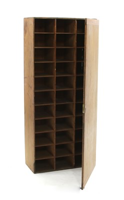 Lot 571 - A late 19th century mahogany pigeon hole cupboard