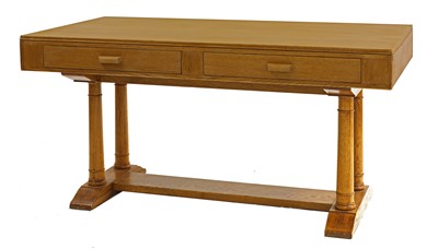 Lot 504 - An Heal's oak library table