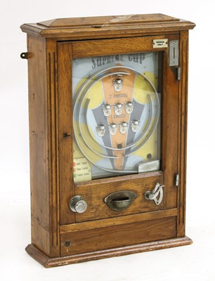 Lot 559 - An oak Allwin amusement machine