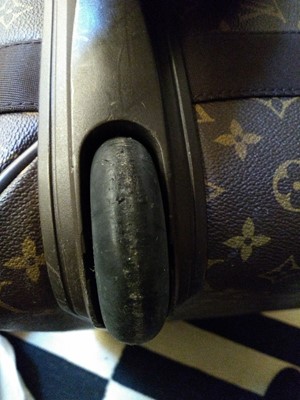 Lot 110 - A Louis Vuitton monogrammed canvas 'Pégase Légère 55' suitcase