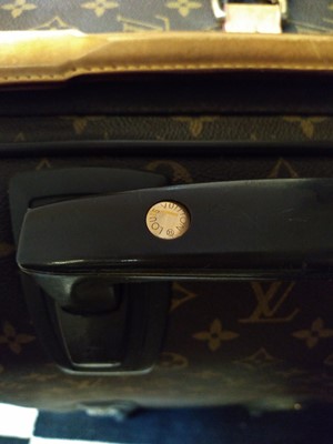 Lot 110 - A Louis Vuitton monogrammed canvas 'Pégase Légère 55' suitcase