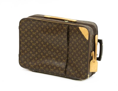 Lot 110 - A Louis Vuitton monogrammed canvas 'Pégase Légère 55' suitcase