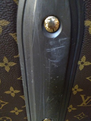 Lot 110 - A Louis Vuitton monogrammed canvas 'Pégase Légère 55' suitcase