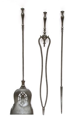Lot 783 - A set of three George III steel fire tools