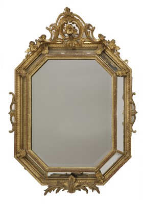 Lot 54 - A carved giltwood framed lozenge-shaped wall mirror