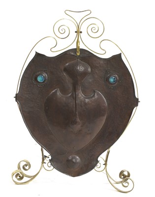 Lot 172 - An Arts and Crafts brass and copper fire screen