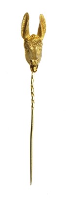 Lot 57 - A gold donkey or ass novelty stick pin, late 19th century or early 20th century
