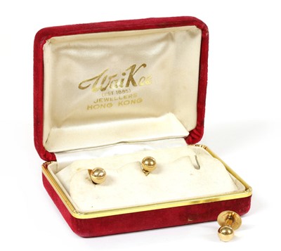 Lot 426 - A cased set of three gold dress studs
