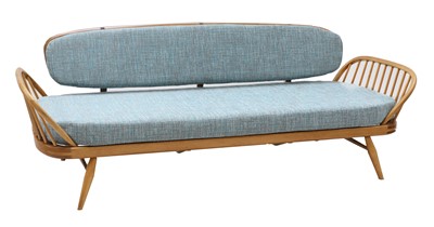 Lot 119 - An Ercol light elm studio settee/daybed