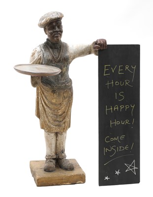 Lot 115 - A Continental carved wooden dumb waiter