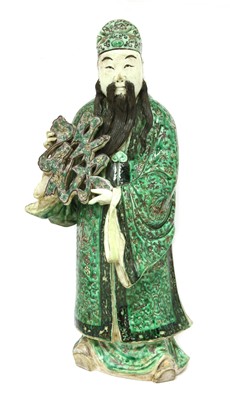 Lot 20 - A Chinese famille verte figure