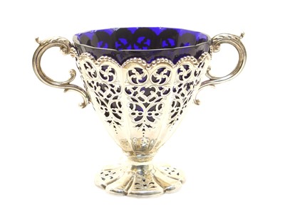 Lot 72 - A Victorian silver pierced twin-handled bonbonniere