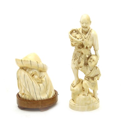 Lot 122 - A Japanese ivory okimono