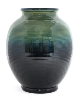 Lot 219 - A William Moorcroft ribbed ovoid vase