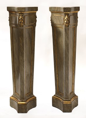 Lot 404 - A pair of faux marble pedestals