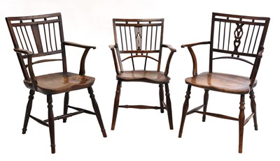 Lot 799 - A yew and elm Mendlesham cottage armchair