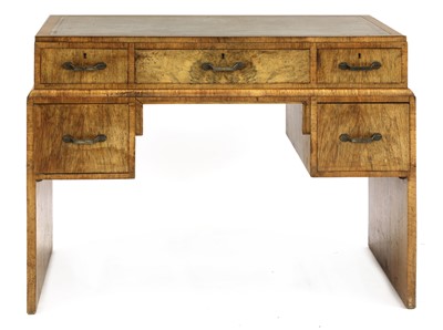 Lot 404 - An Art Deco walnut desk