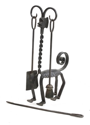 Lot 170 - An unusual large Art Deco fireside companion