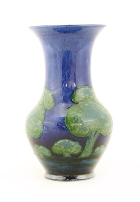 Lot 213 - A Moorcroft 'Moonlit Blue' baluster vase