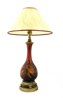 Lot 212 - A Moorcroft flambé 'Orchid' table lamp