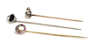 Lot 59 - Three Art Deco diamond set stick pins
