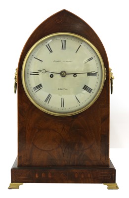 Lot 69 - A mahogany lancet-cased bracket clock