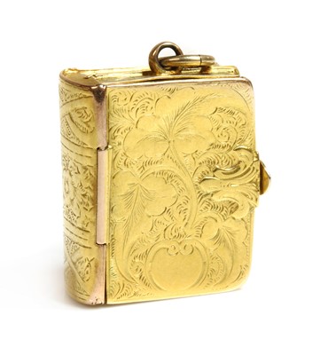 Lot 62 - A Victorian rectangular hinged locket of book form
