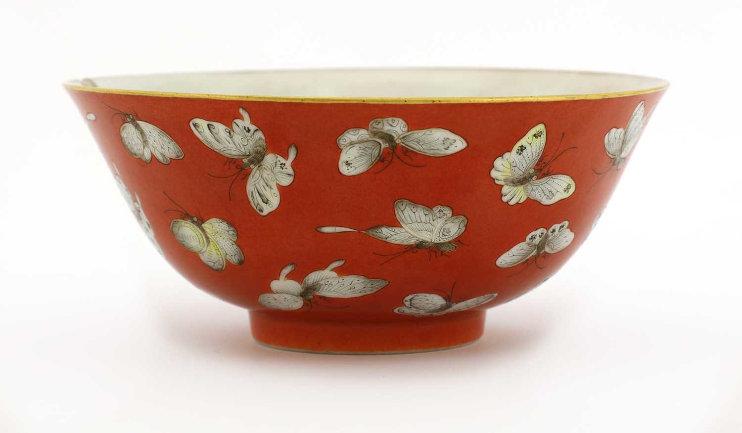 Lot 122 - A Chinese coral-ground famille rose bowl