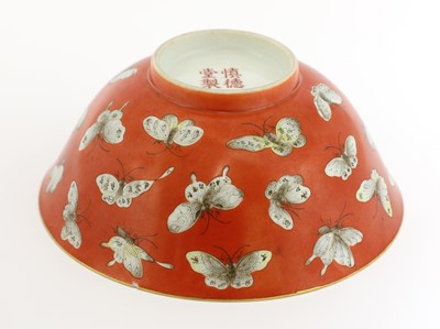 Lot 122 - A Chinese coral-ground famille rose bowl