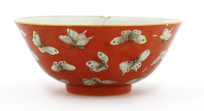 Lot 122 - A Chinese coral-ground famille rose bowl