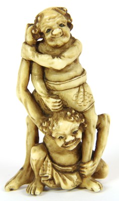 Lot 453 - A Japanese ivory okimono