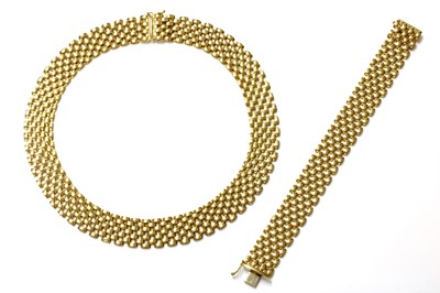 Lot 287 - A Continental gold four row panther link necklace and bracelet suite