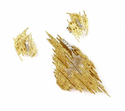 Lot 195 - An 18ct gold diamond set brooch and earring suite by Andrew Grima, c.1970