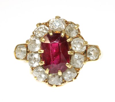 Lot 41 - A late Victorian ruby and diamond oval cluster ring