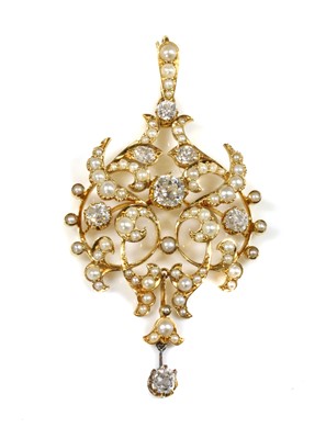 Lot 96 - A late Victorian diamond and split pearl cartouche shaped brooch/pendant, c.1890