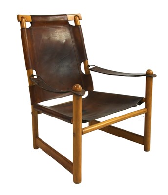 Lot 391 - An Italian leather and pine chair