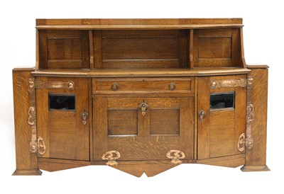 Lot 14 - An Arts and Crafts oak cabinet