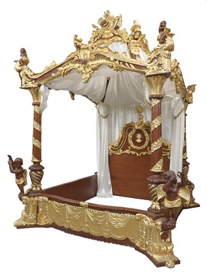 Lot 314 - A modern Baroque revival carved and gilded four post bed