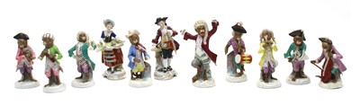 Lot 342 - A ten piece German porcelain monkey band